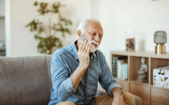man with tooth pain
