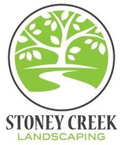 Logo: Green tree and river in a circle, with