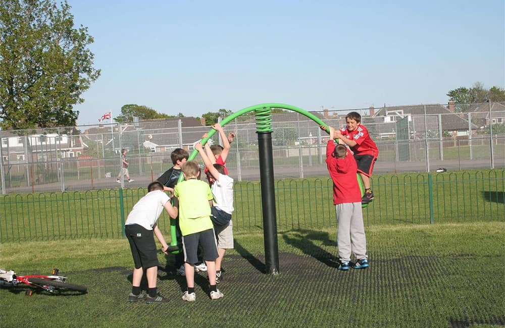 Children on Playground Seesaw