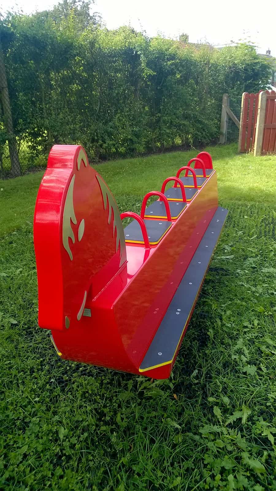 rocking horse on grass mat