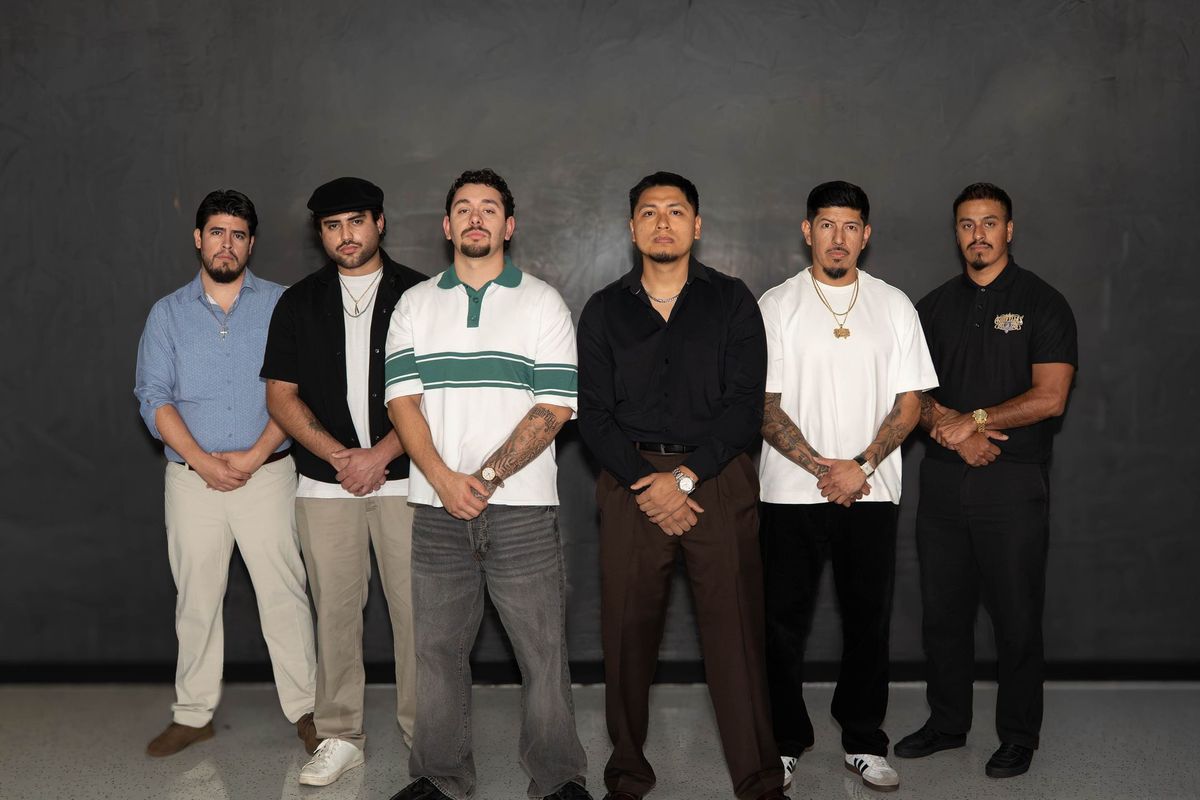 The Goodfellas Barbershop team together in the shop