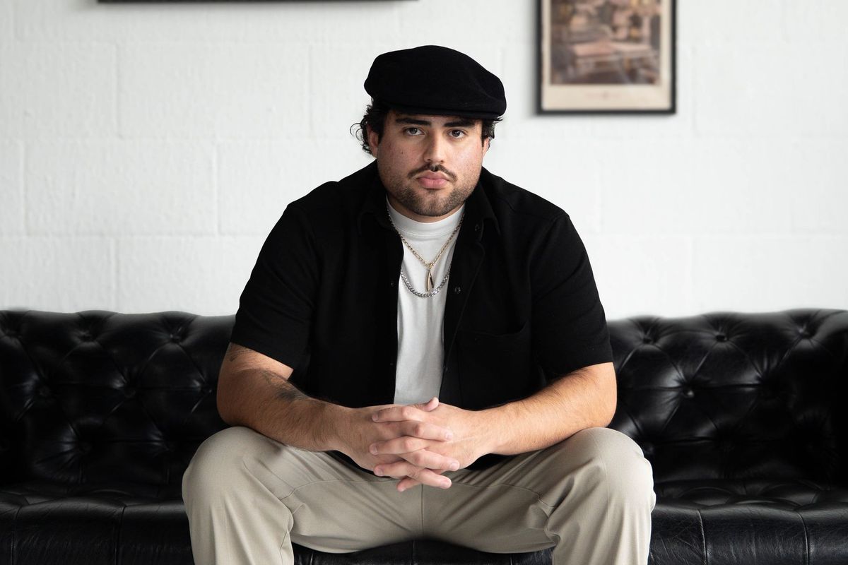Portrait of Juan Zambrano, founding barber at Goodfellas Barbershop