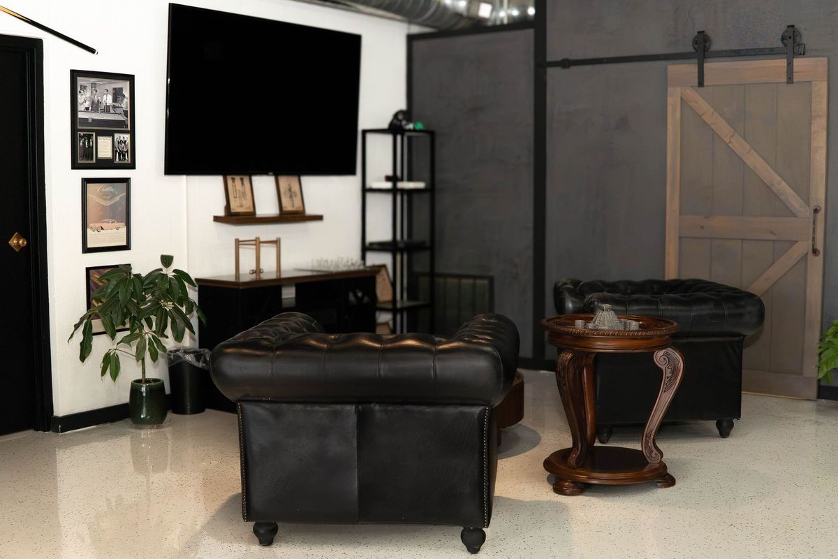 Customer waiting area at Goodfellas Barbershop