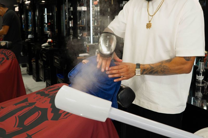 Hot towel with massager at Goodfellas Barbershop