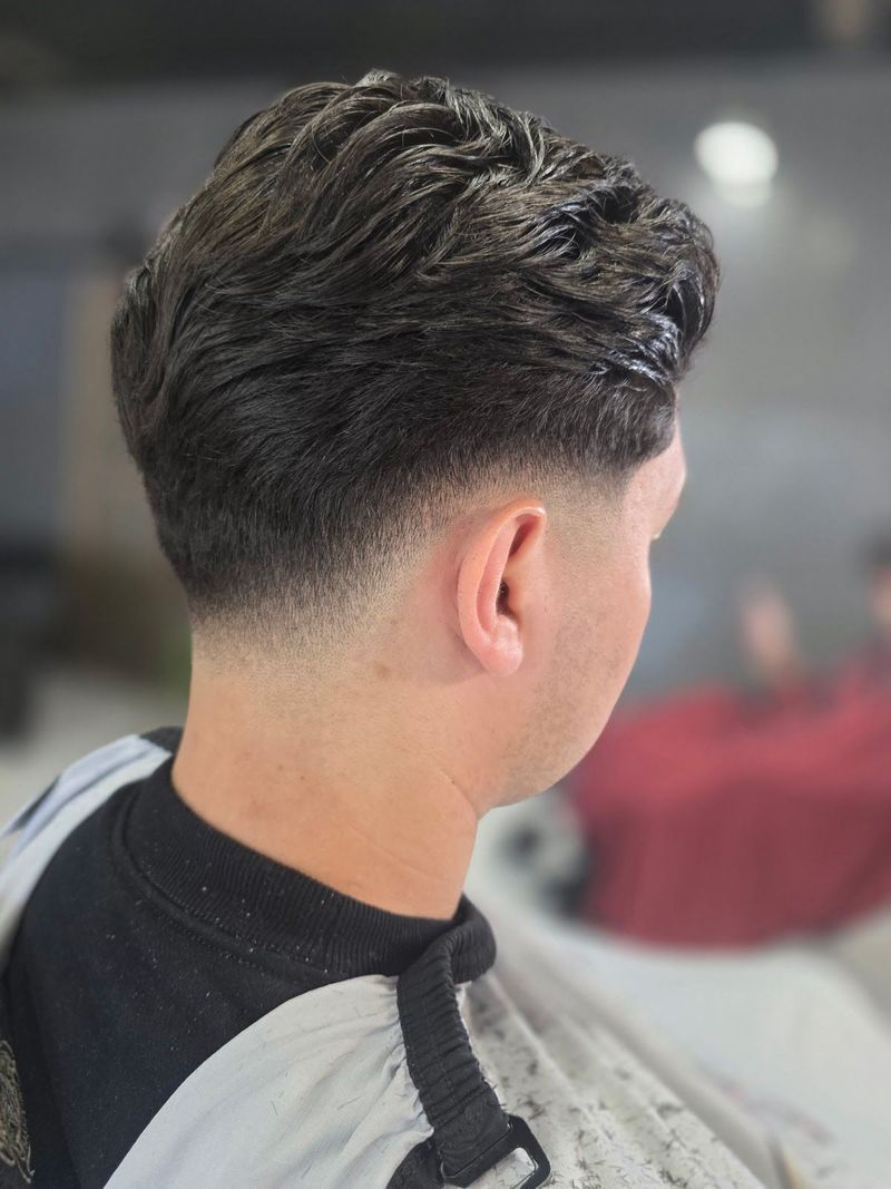Long hair taper finished at Goodfellas Barbershop in Schererville