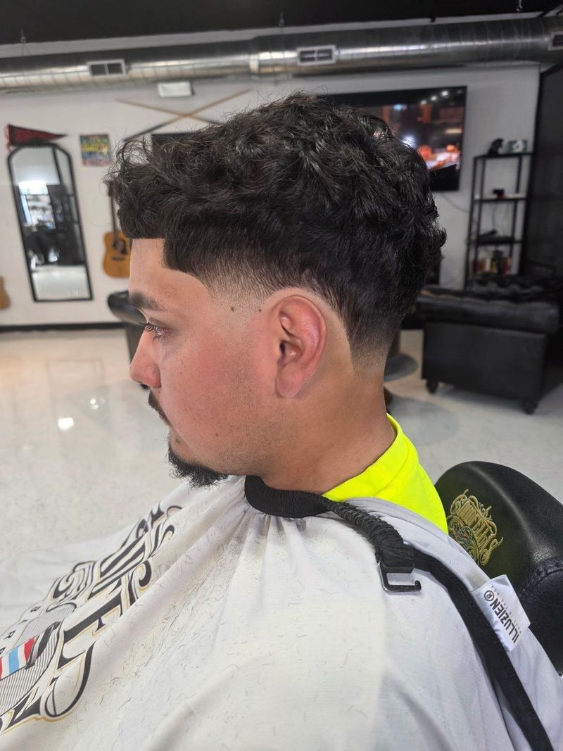 Long hair taper at Goodfellas Barbershop in Schererville