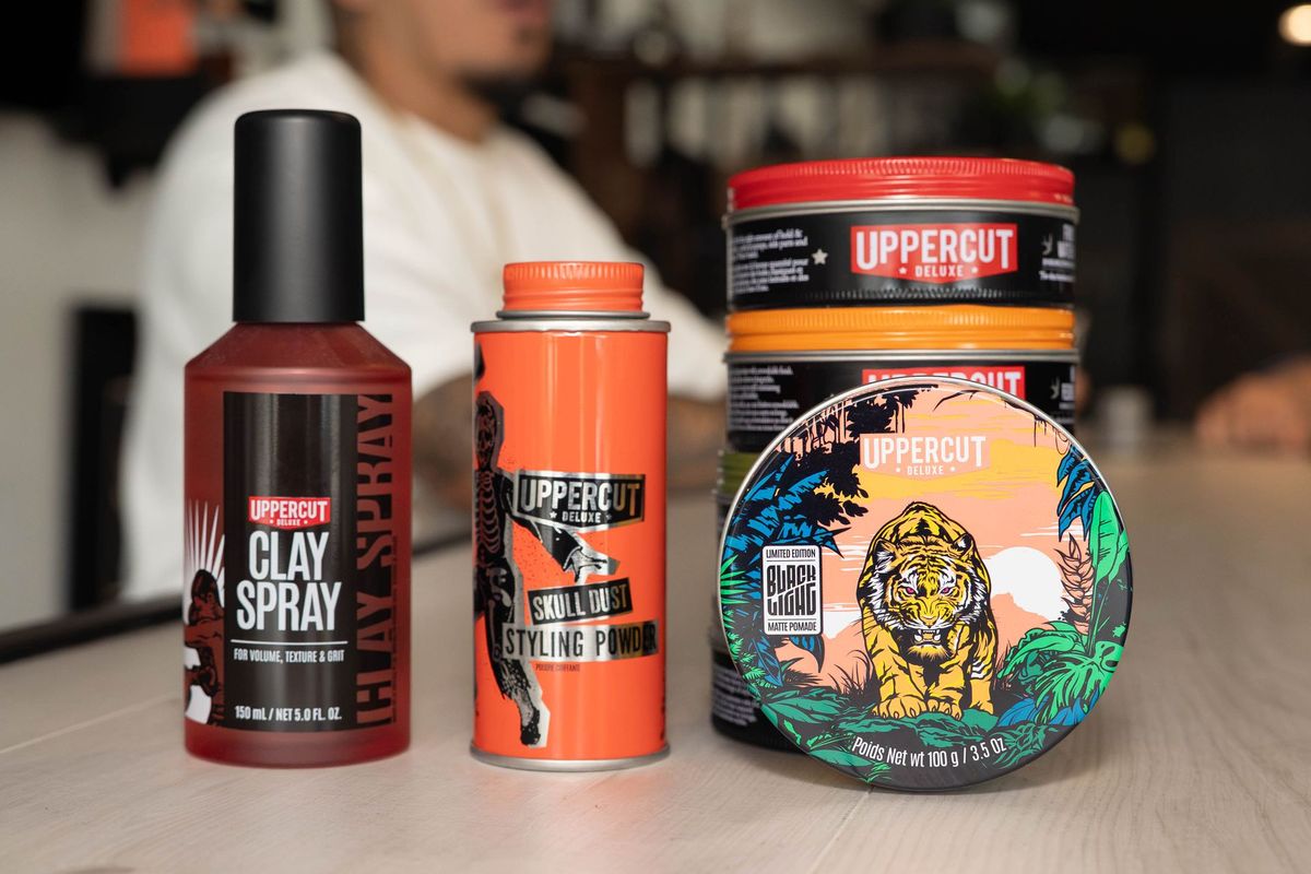 Retail shelf of grooming products at Goodfellas Barbershop