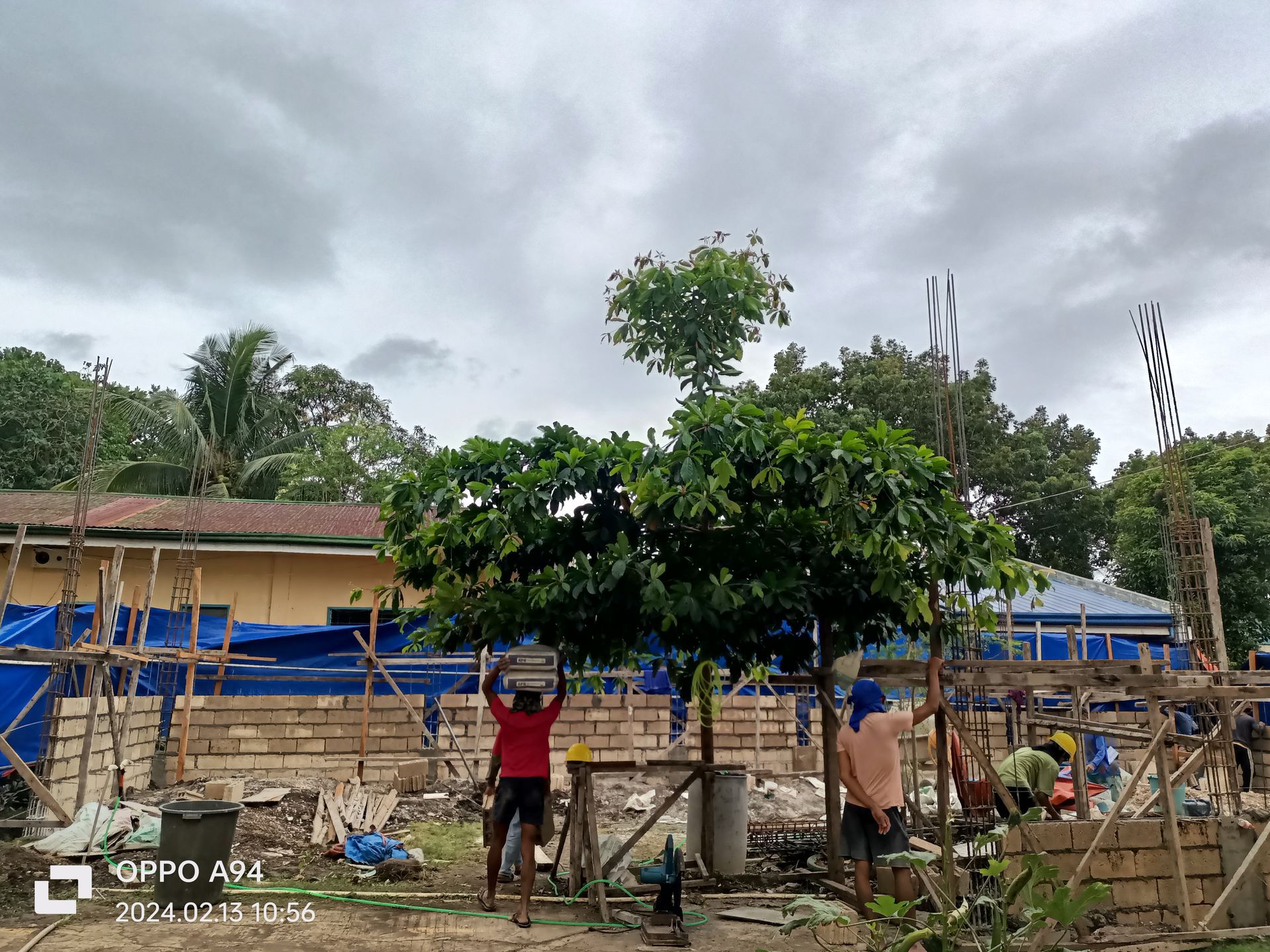 A group of people are working on a construction site.
