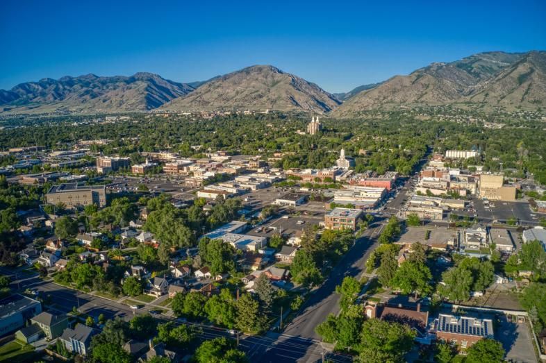 An Aerial View Of A City With Mountains In The Background — Active Ables Community Services In Logan, QLD