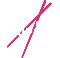 A pair of chopsticks are broken in half on a white background.