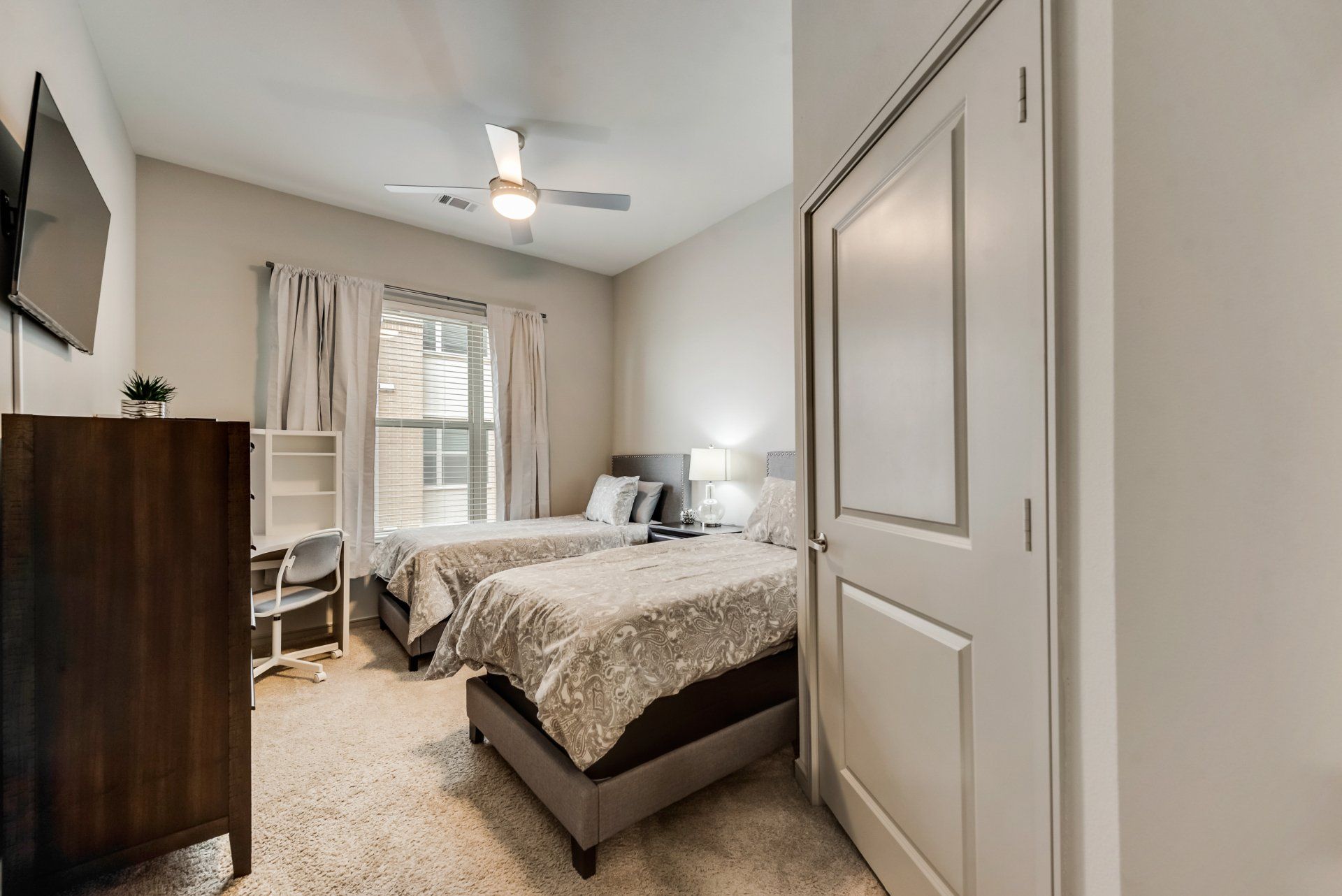Luxury staged bedroom in furnished apartment at Lake Carolyn in Las Colinas, Irving TX