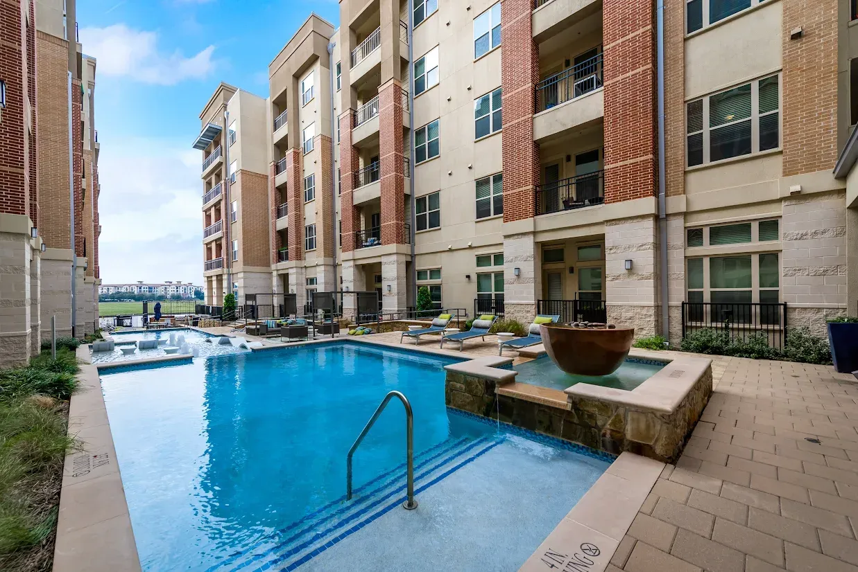 Exterior of furnished apartment community at Lake Carolyn in Las Colinas Irving TX