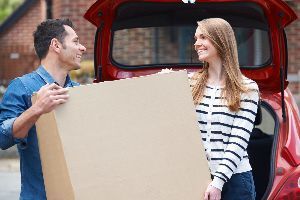 Man And Woman Holding Box | Staunton, VA | American Mini Storage Man And Woman Holding Box | Staunton, VA | American Mini Storage