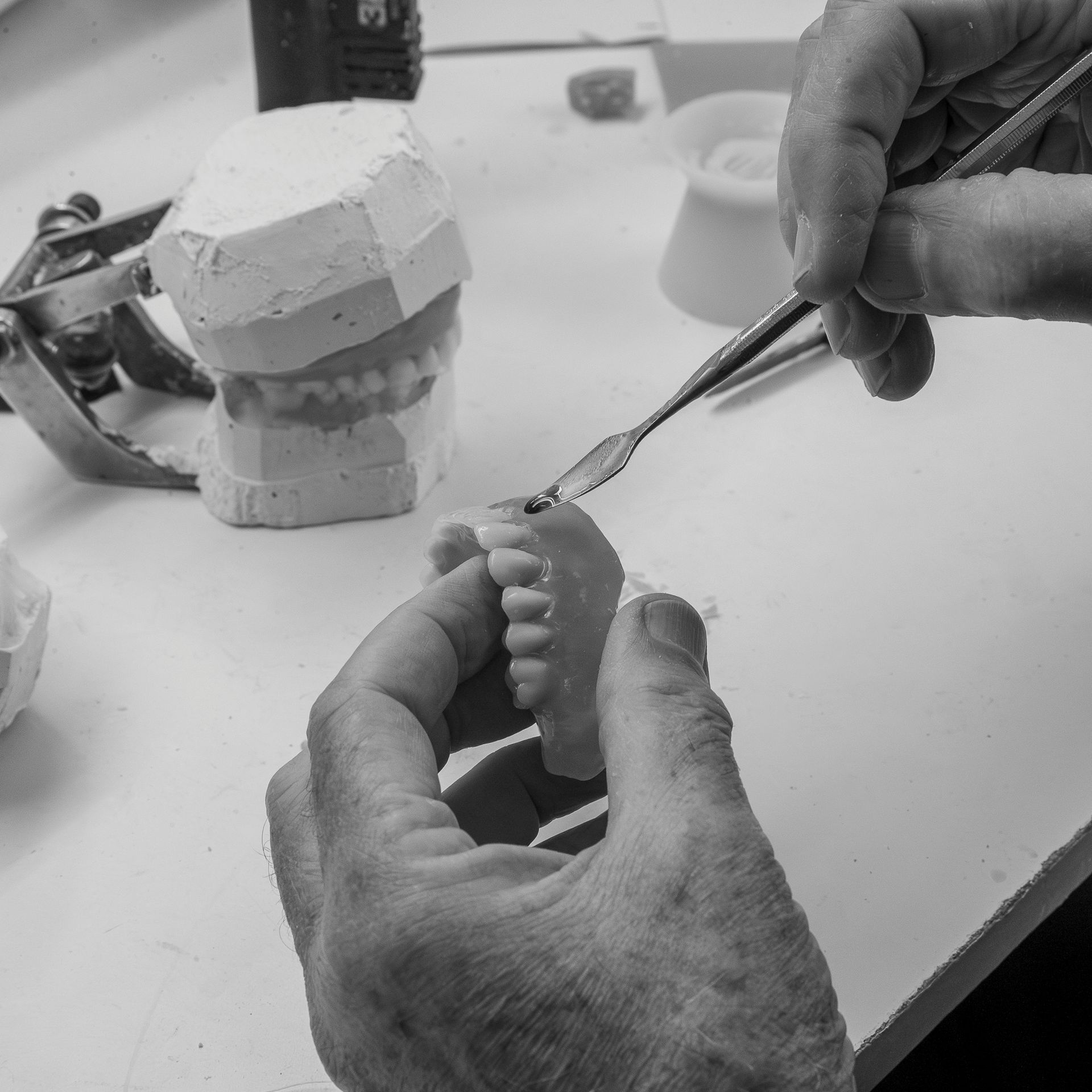 Hands Shaping a Small Model — Smiles On Hobart in Hobart, TAS