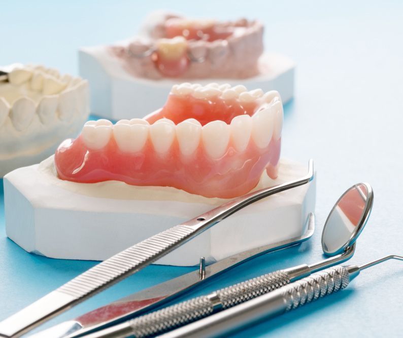 Dental Dentures on Display With a Mirror — Smiles On Hobart in New Town, TAS