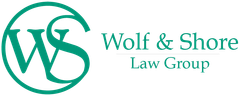 Wolf & Shore Law Group logo with teal “WS” monogram and text on white background