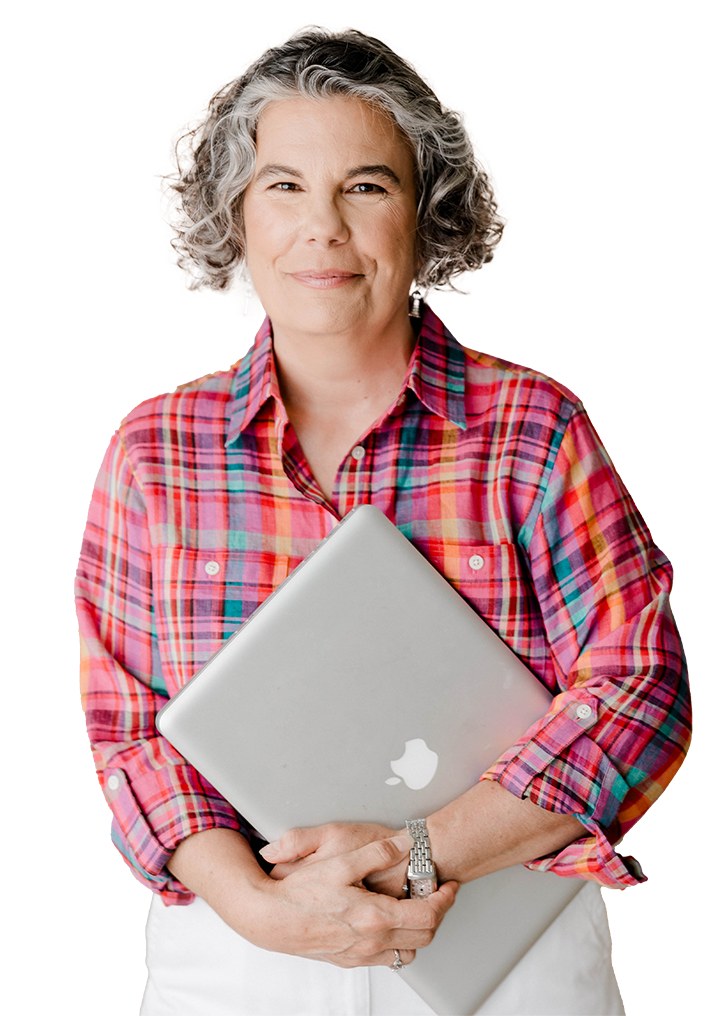 Melissa Berger A woman in a plaid shirt is holding an apple laptop