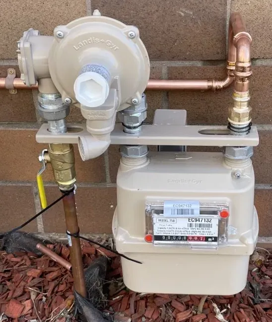 Gas Meter Attached to a Wall With Copper and Steel Pipes — All Stars Plumbing In Barrack Heights, NSW