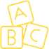 Yellow alphabet blocks stacked: 
