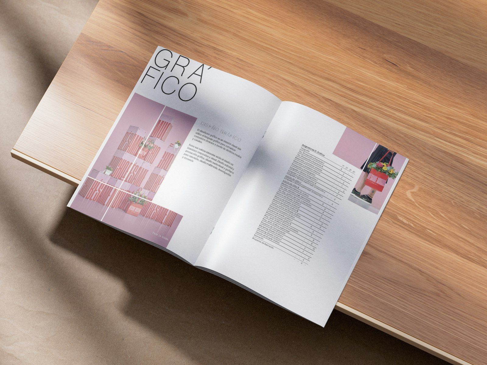 An open printed brochure on a wooden surface