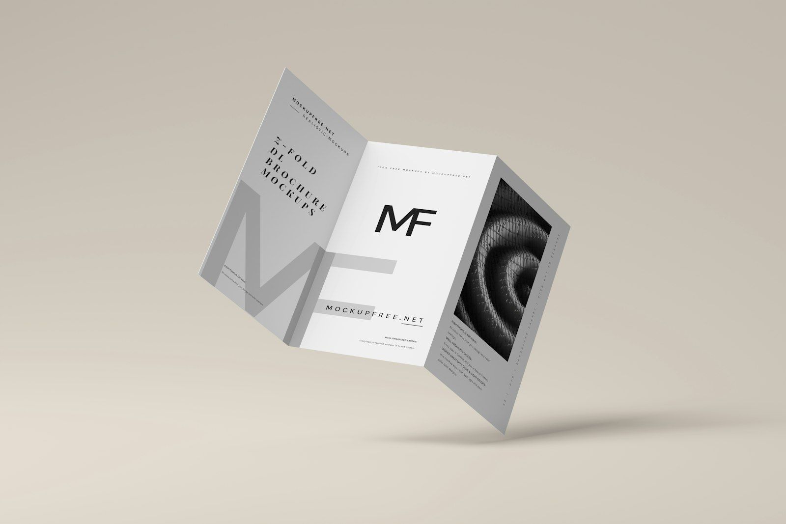 A folded black-and-white brochure with a bold identity