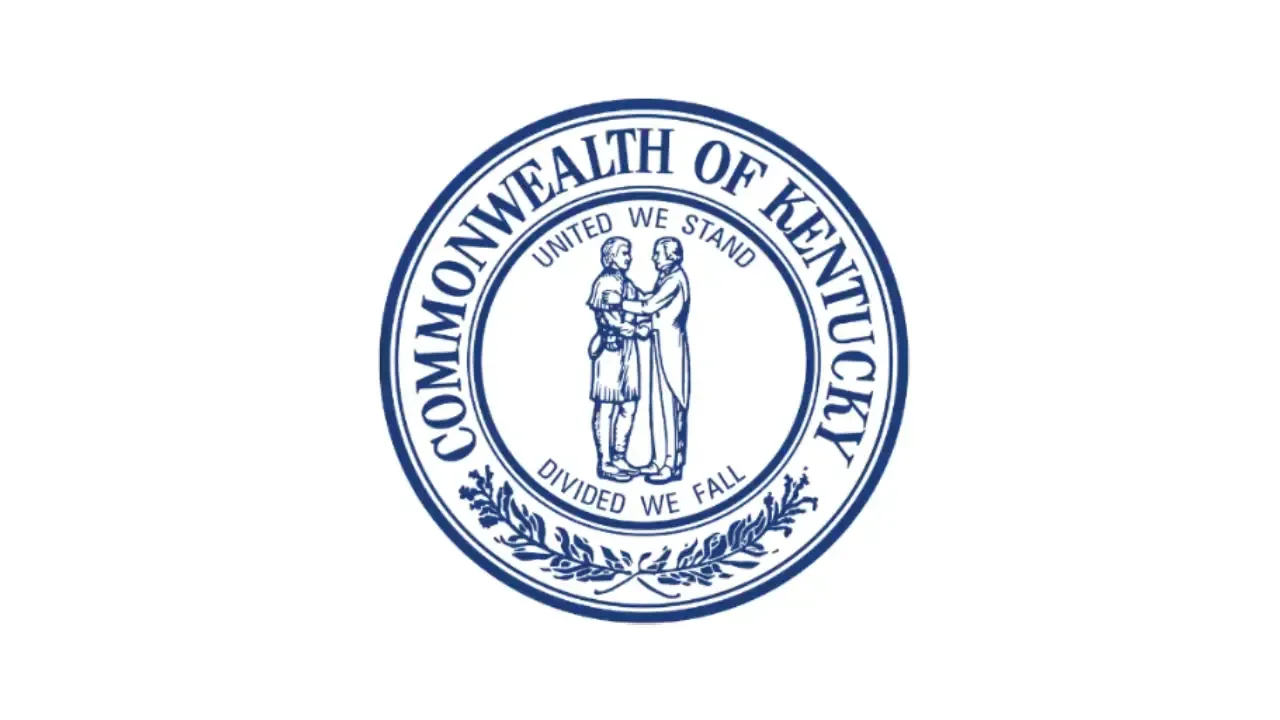 Seal of the Commonwealth of Kentucky in blue and white, with two figures and the state motto.