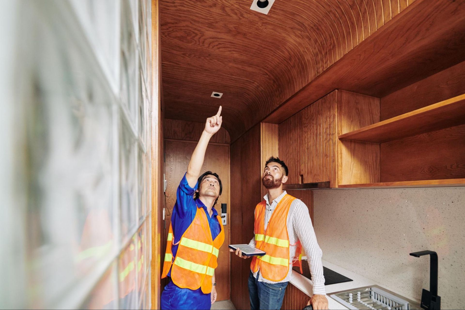 Electrical systems being checked by inspectors during a home inspection.
