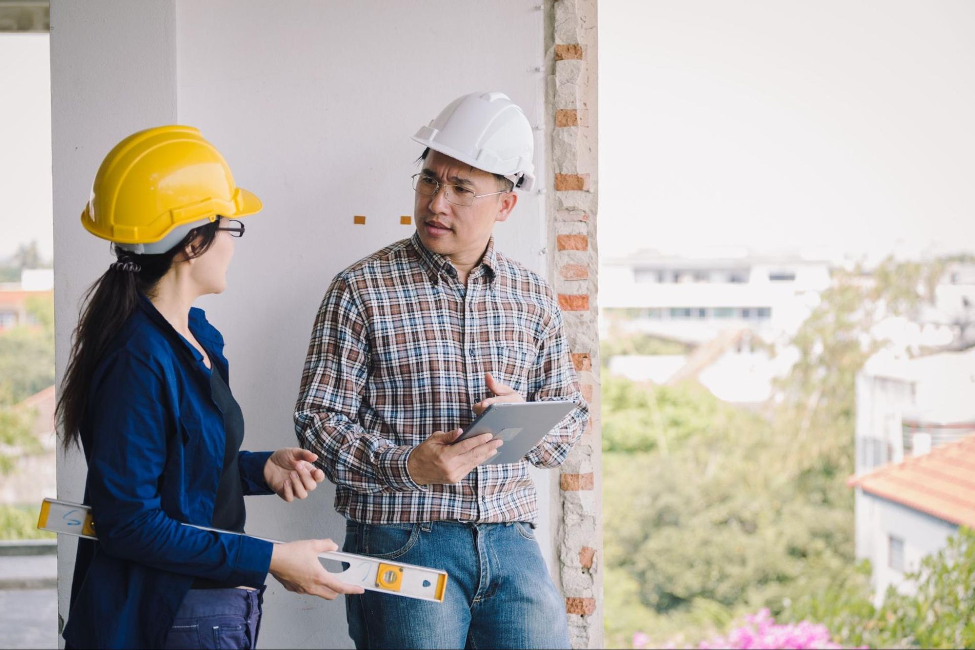 two people conducting a home inspection, symbolizing the importance of an FHA home inspection in Pasadena TX