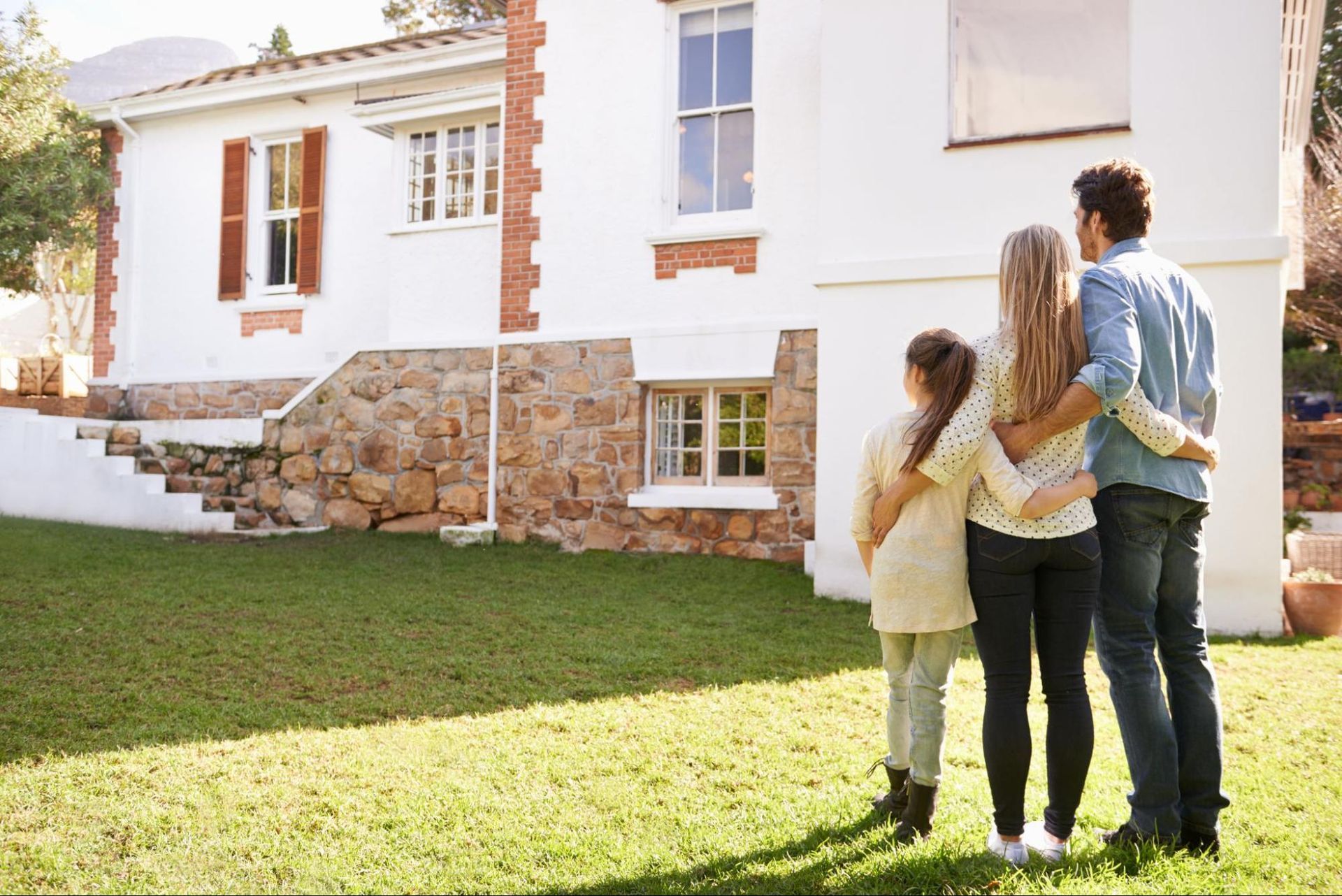 Homeowner enjoying a comfortable home after addressing energy efficiency concerns in Summerwood