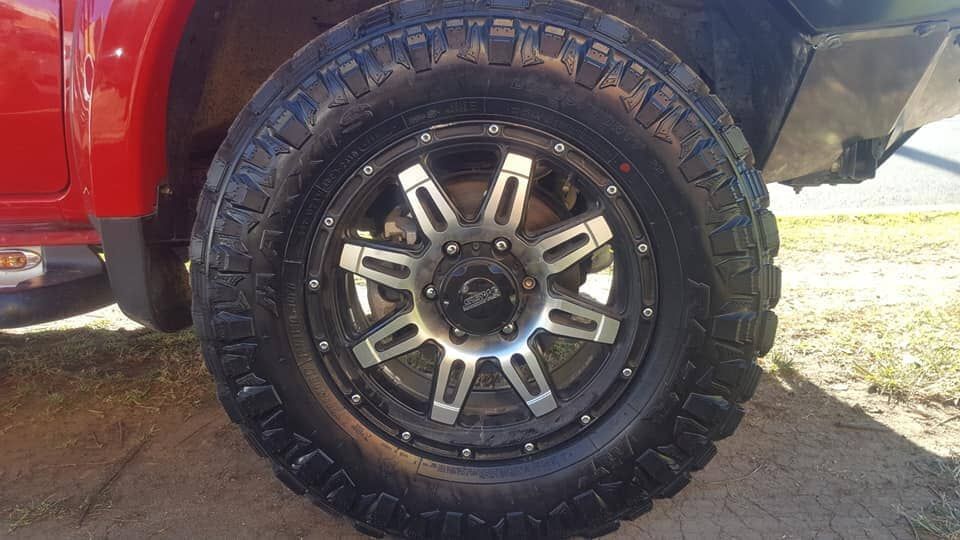 Mechanic Fitting Tyres — Auto Repair Services in Picton, NSW