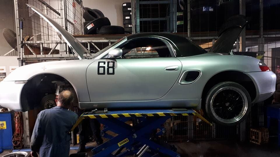 Mechanics Fixing Underside of Car — Auto Repair Services in Picton, NSW