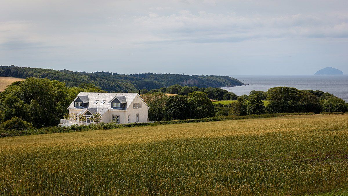 Outside from a field on a summer's day Castlehill Cottage, Croy