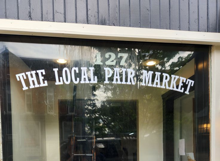 Signage on glass window: 