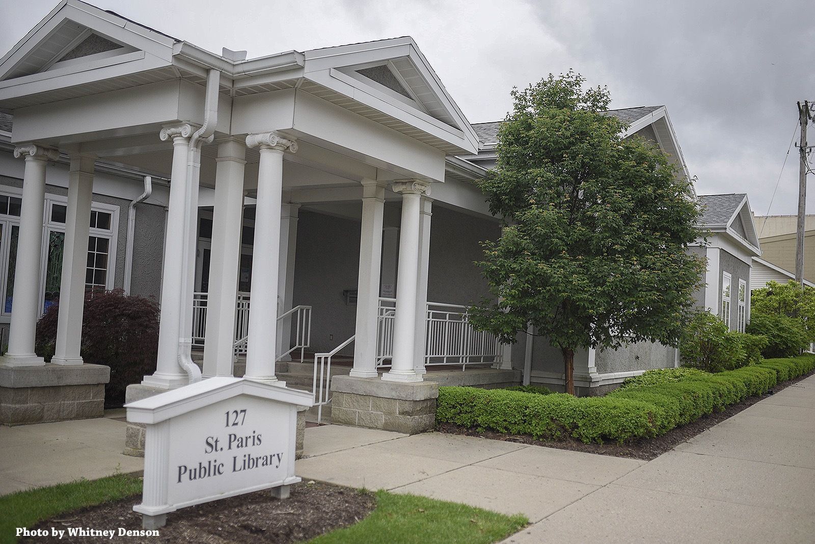 St. Parks Public Library, a one-story building with white columns and sign.