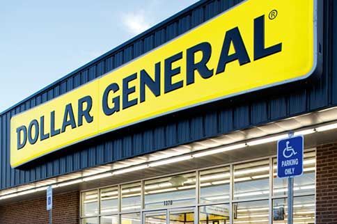 Dollar General store exterior with yellow sign, blue accents, and accessible parking.