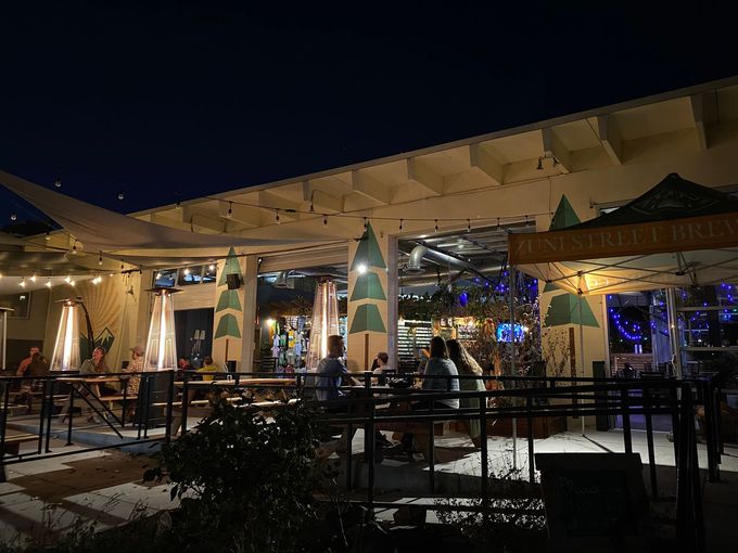 the outside of a restaurant with a sign that says zunistreet brew