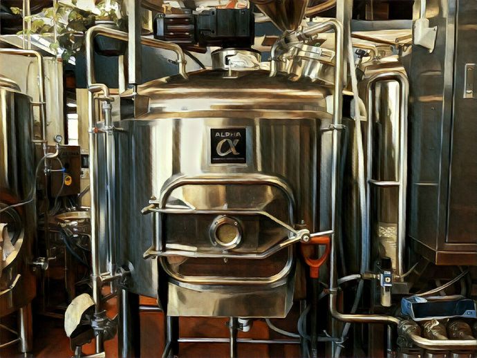 a large stainless steel tank that says alpha on it