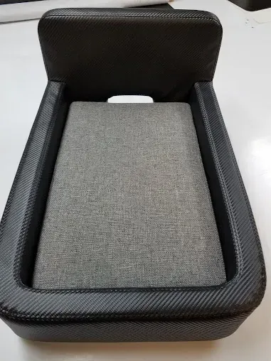 Open black fabric case with gray cushioned interior on a white background