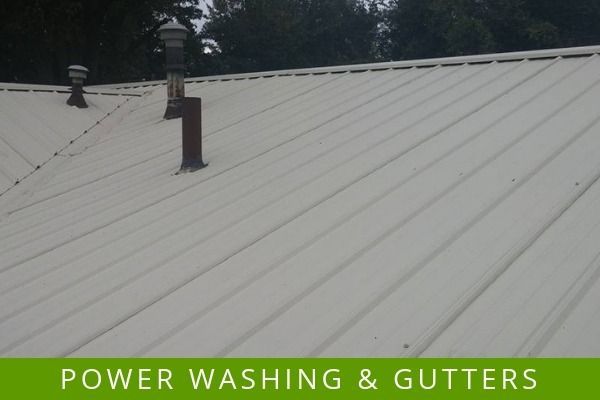 White metal roof with vents, labeled “POWER WASHING & GUTTERS” at the bottom.