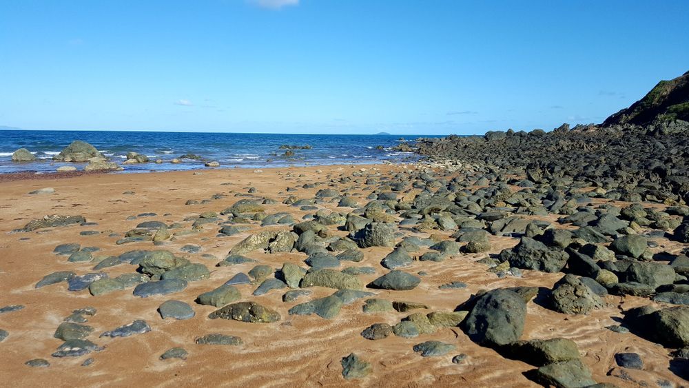 A Rocky, Golden-sand Beach Stretches Toward — Reynolds Built In Golden Beach, QLD