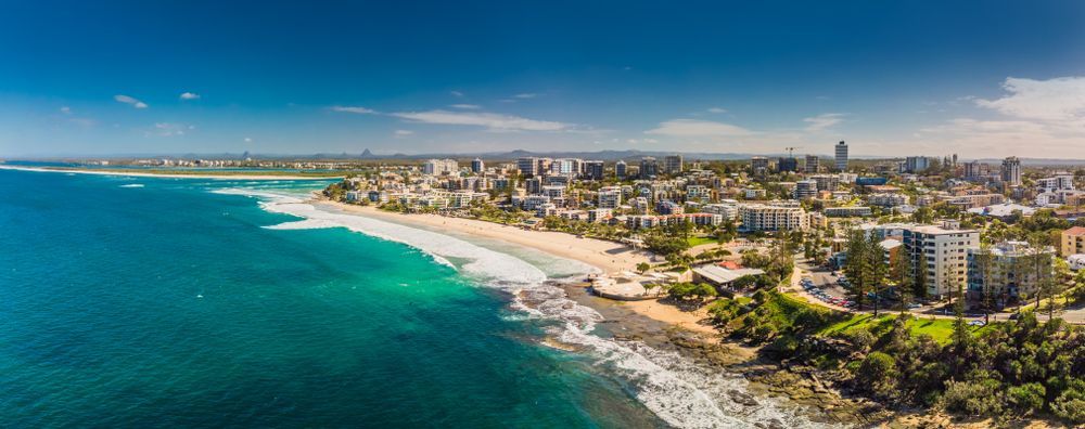 An Aerial View of a Coastal City With a Beach — Reynolds Built In Caloundra, QLD