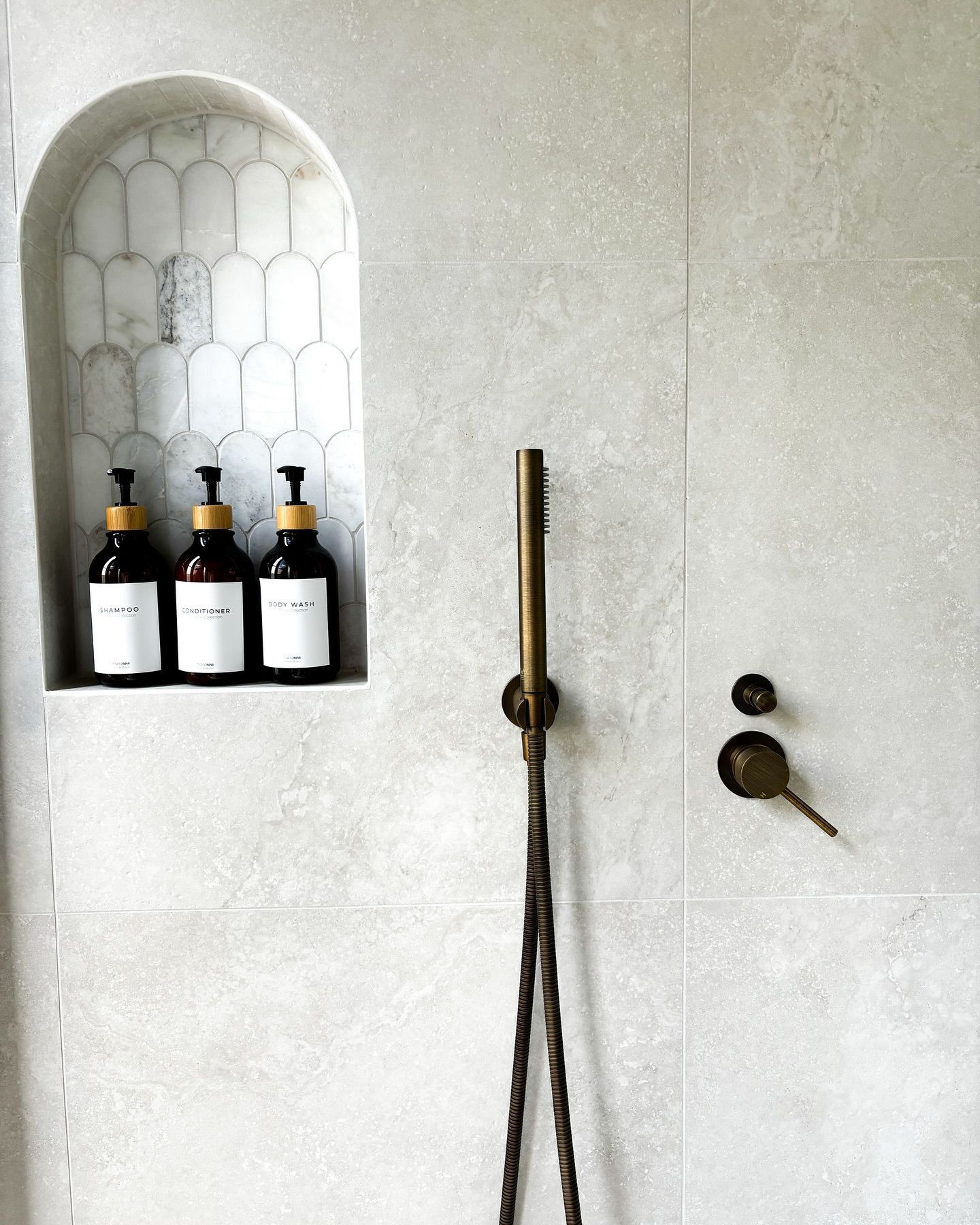 Three Bottles Of Soap Are On A Shelf In A Shower — Reynolds Built in Moffat Beach, QLD