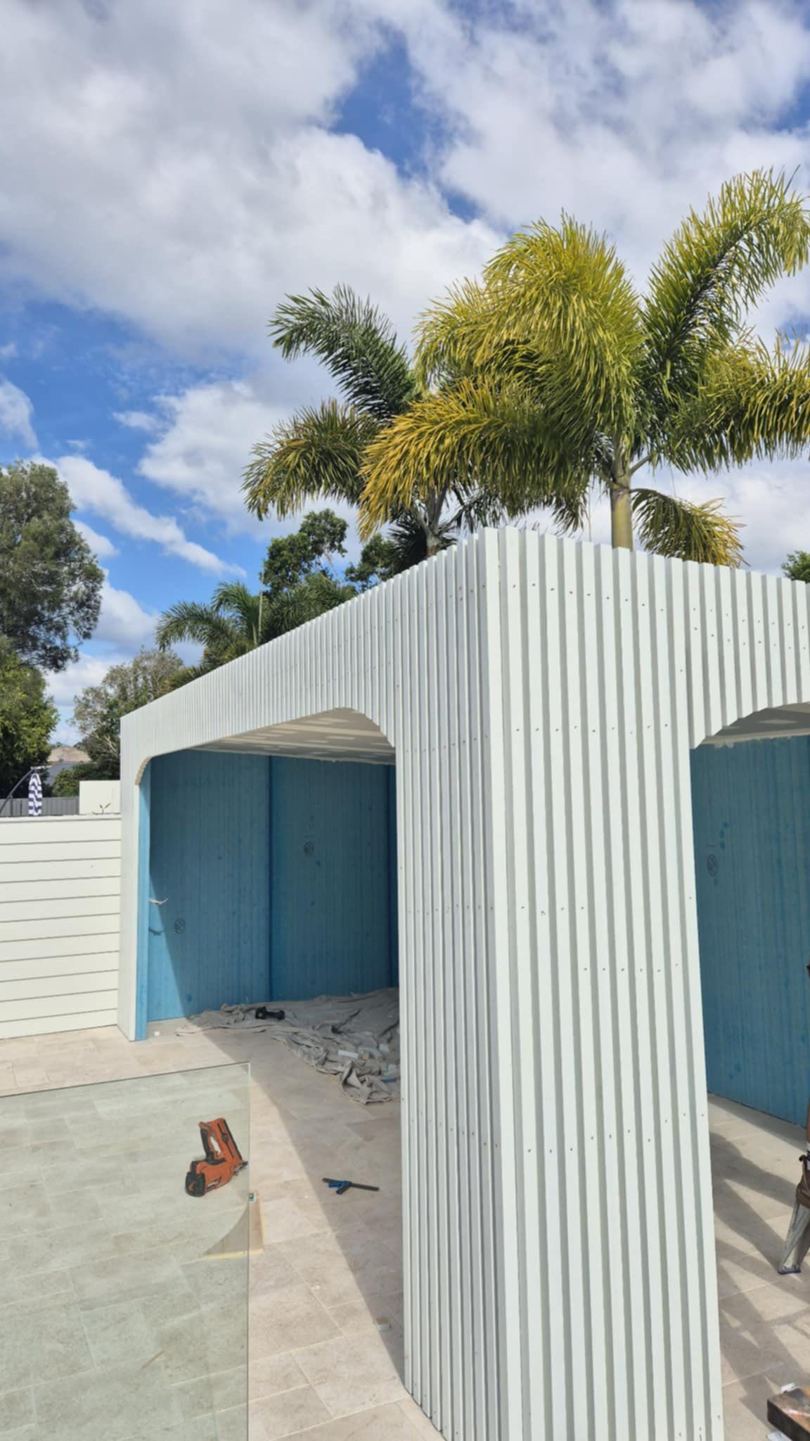 A White Corrugated Metal Pavilion Structure — Reynolds Built In Little Mountain, QLD