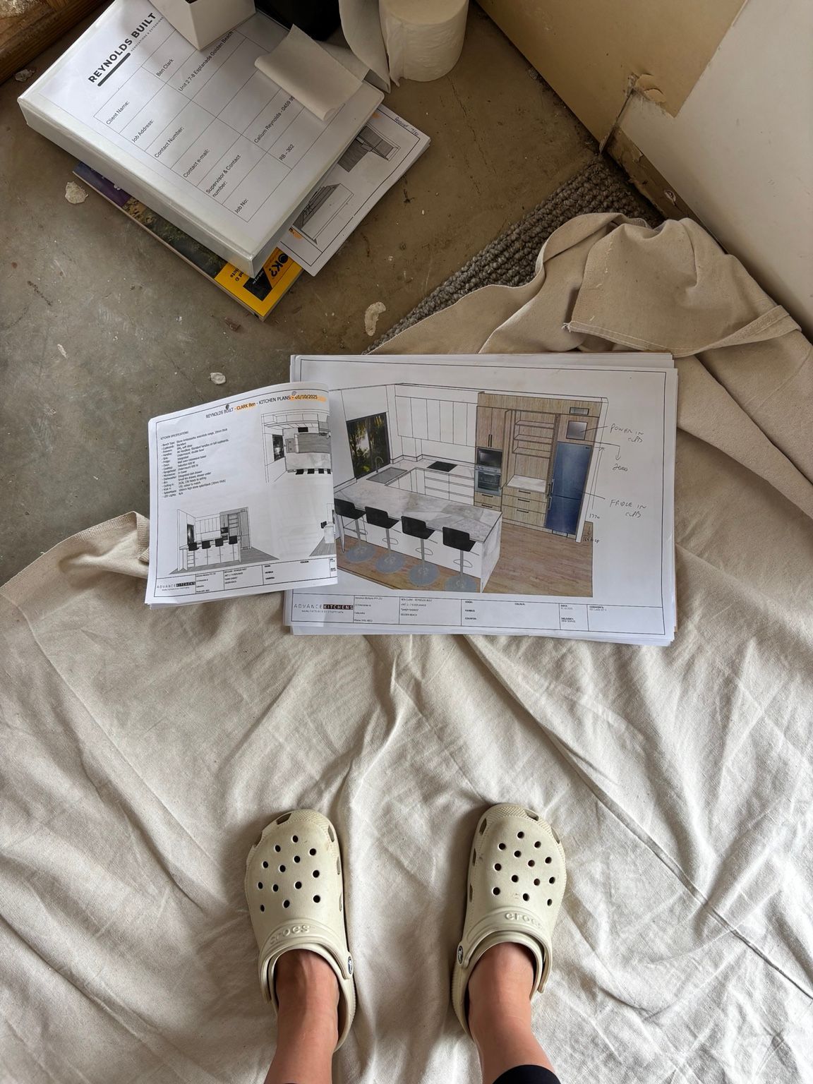 Person in Beige Clogs Standing on a Bed Beside Open Instruction — Reynolds Built In Moffat Beach, QLD