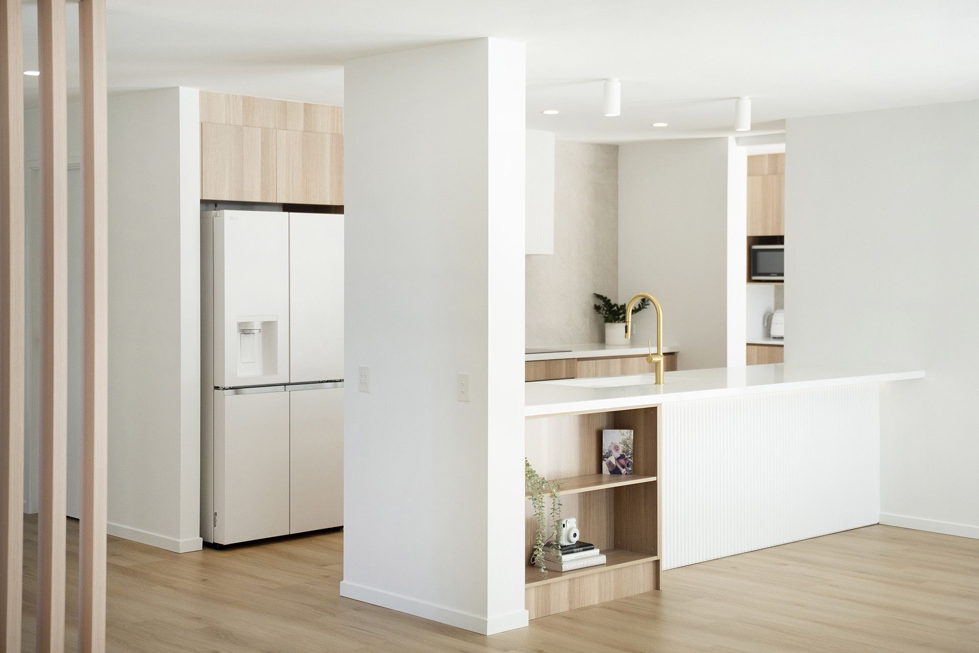 Modern Kitchen With White Cabinets, a Light Wood Refrigerator — Reynolds Built In Moffat Beach, QLD