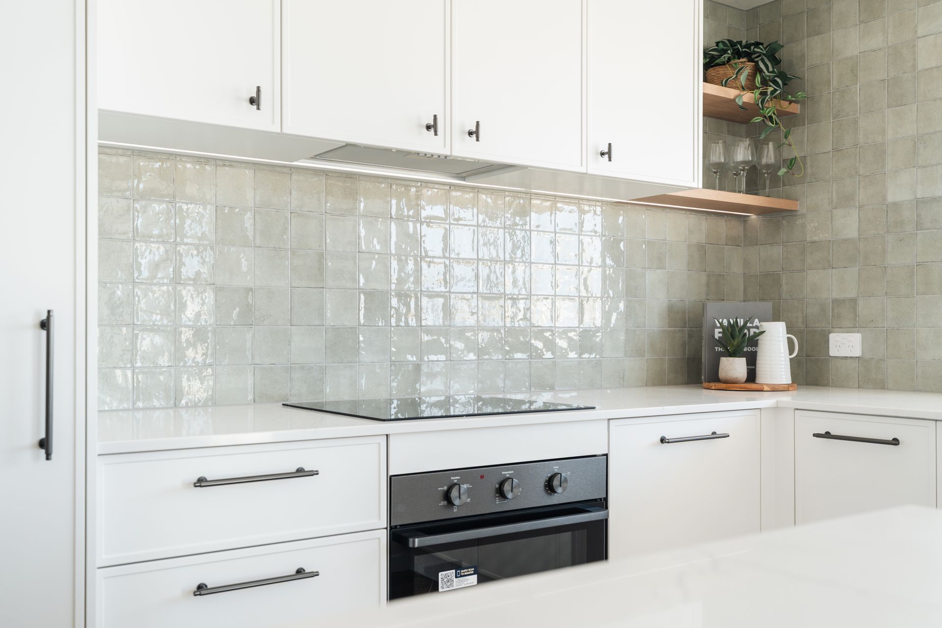 Modern White Kitchen With Glass Tile Backsplash — Reynolds Built In Moffat Beach, QLD