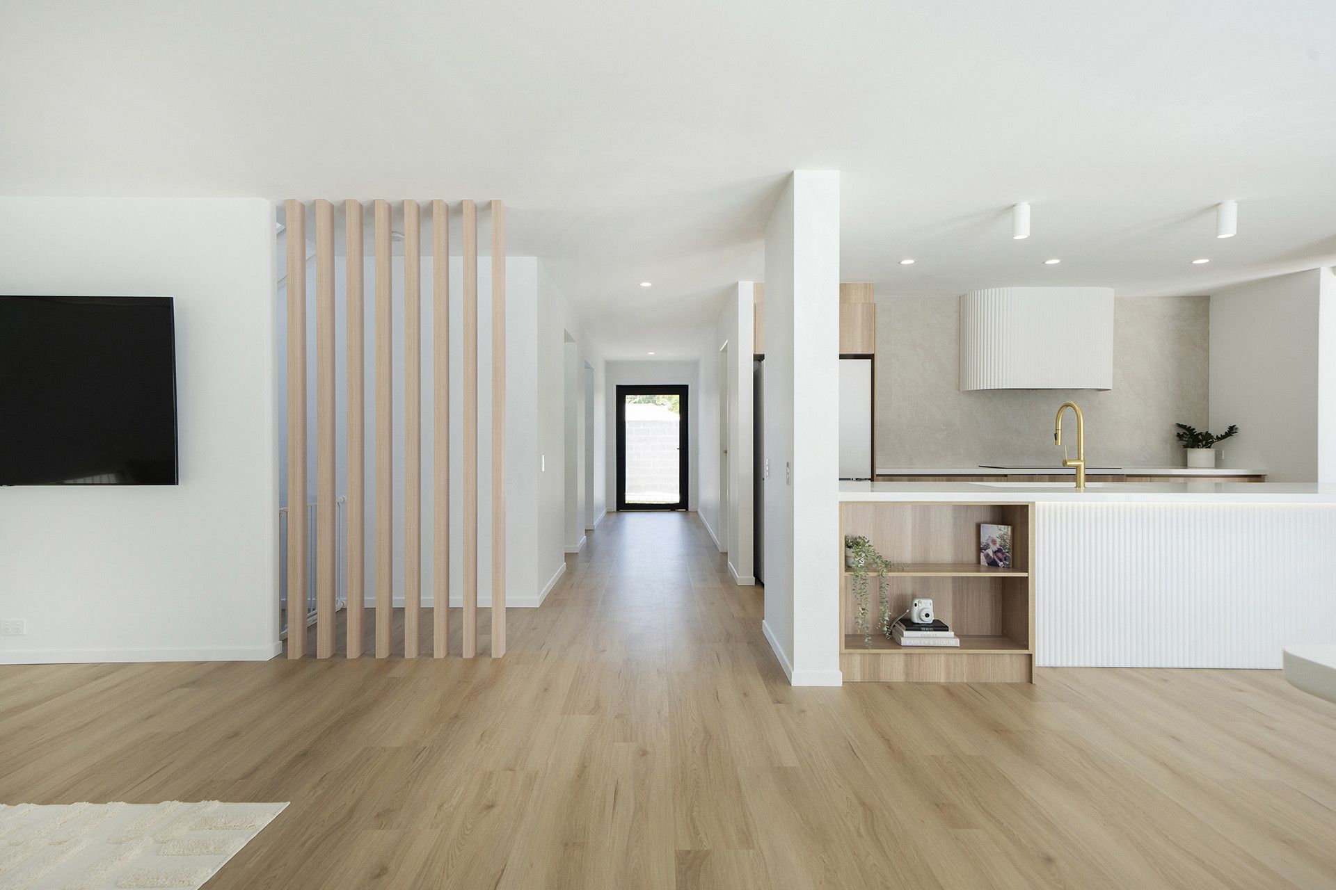 A Bright, Open-plan Interior Featuring Light Wood Flooring — Reynolds Built In Maroochydore, QLD