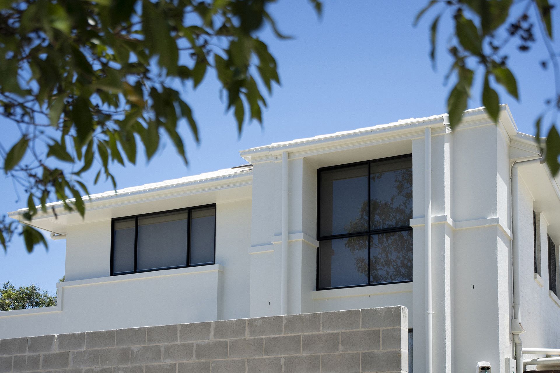 A Modern White House With Black-framed Windows — Reynolds Built In Caloundra, QLD