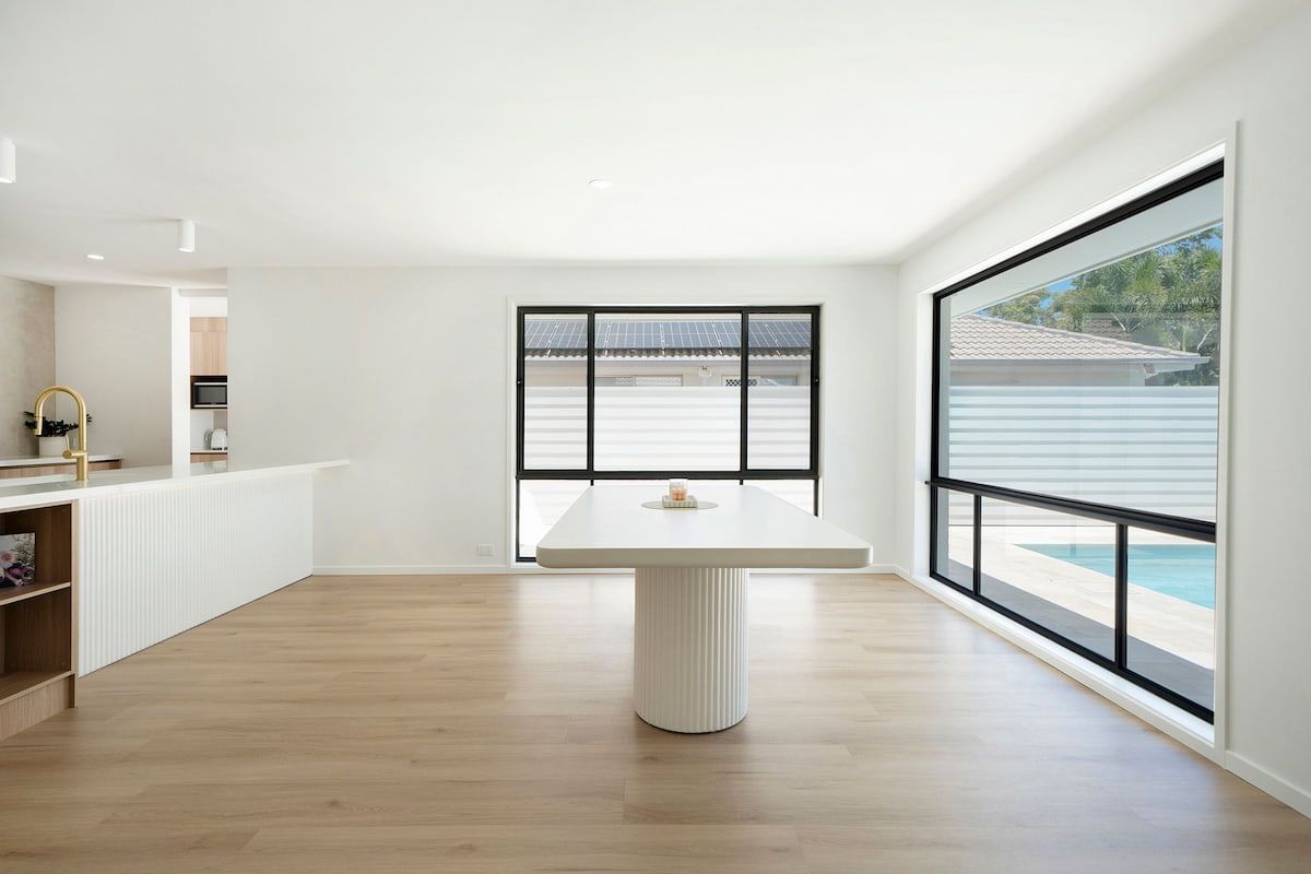 Bright Open Living Room With Wood Floors, White Walls — Reynolds Built In Mooloolaba, QLD