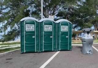 Special Event Port-O-Potties — Portable Restrooms and Company Truck in Tampa Bay, FL Special Event Port-O-Potties — Portable Restrooms and Company Truck in Tampa Bay, FL